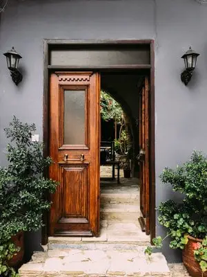 opened brown wooden french door 1544420